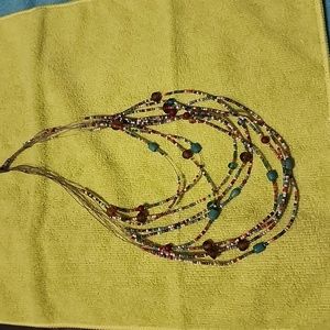 Multi layered tiny beaded necklace